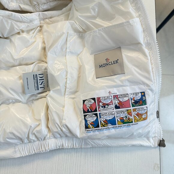 This Moncler white down vest features a mini-puffy design, offering warmth and c - Picture 5 of 8